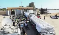 تحقيق: المخابرات المصرية تفرض إتاوات مقابل السماح بدخول المساعدات لغزة.. "5 آلاف دولار للشاحنة"