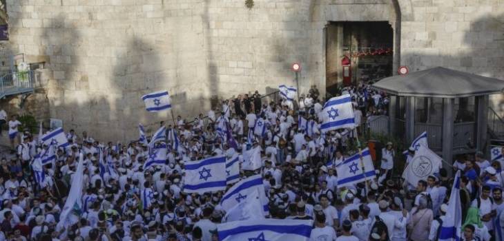 مسيرة-رقصة-الأعلام-750x430