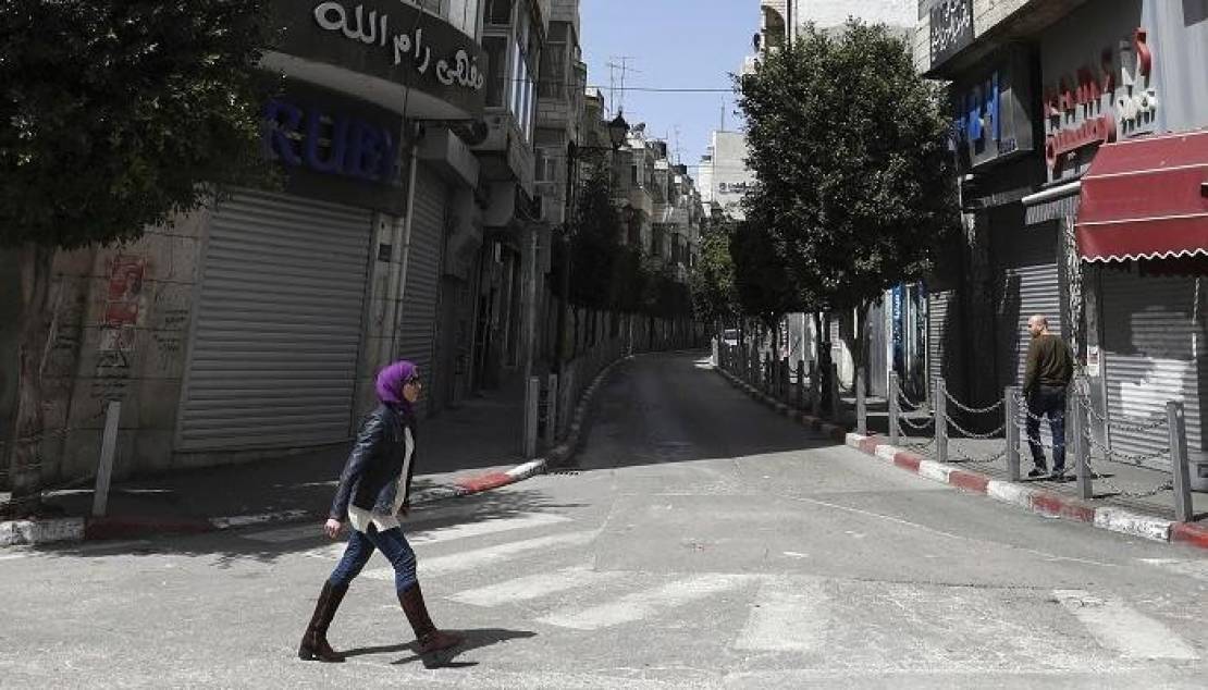 133-002839-empty-streets-closed-shops-palestine-decision_700x400