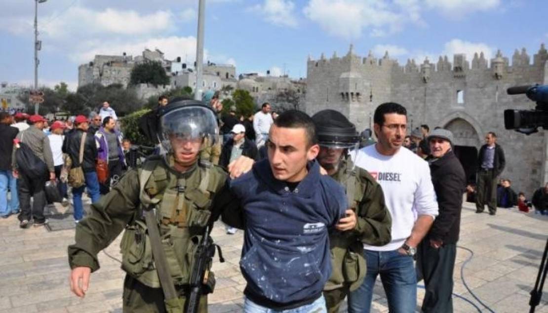 76-132341-jerusalemites-arrest-israeli-weapon-suppress-palestinian-uprising_700x400