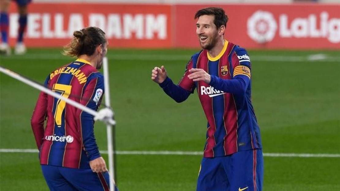 Antoine-Griezmann-and-Lionel-Messi